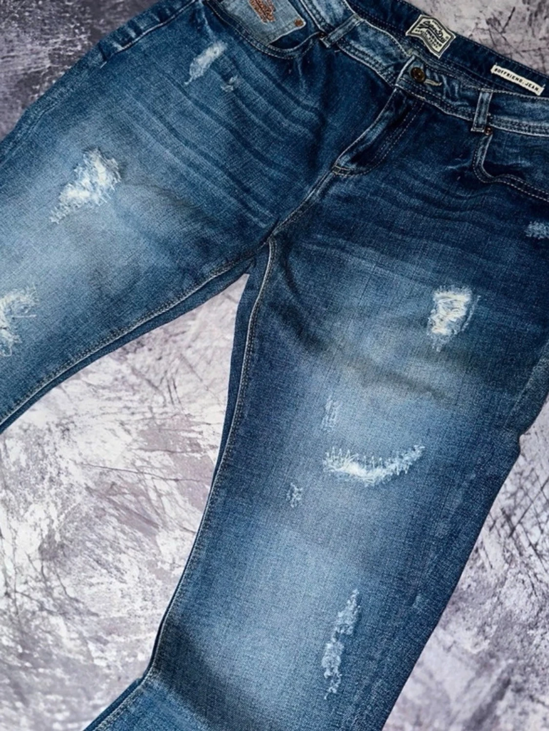 Blå slitna jeans med raka ben - 1