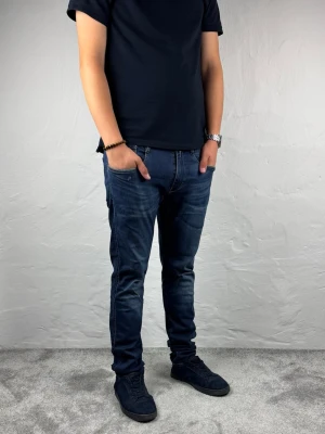 Replay jeans  - Ett par riktigt snygga jeans från Replay i storlek W33 L34 i modellen Anbbas Hyperflex 