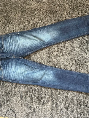 Vintage jeans från Jack & Jones - Feta vintage jeans från Jack and Jones med massa fading 