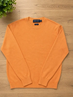 Orange stickad tröja Polo Golf - Snygg orange stickad tröja från Polo Golf Ralph Lauren i 100% bomull. Klassisk rund halsringning och ribbade muddar vid ärmslut och nederkant. Perfekt för dig som vill ha en stilren och bekväm look.