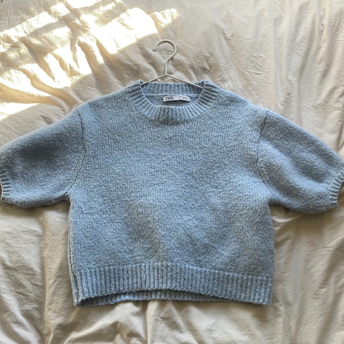 Blå stickad t-shirt 