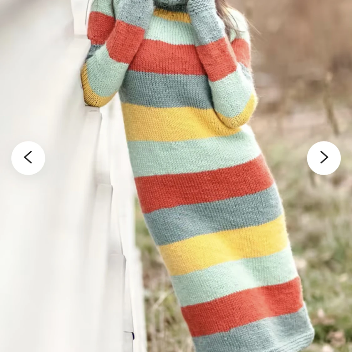 Ny  handstickad klänning