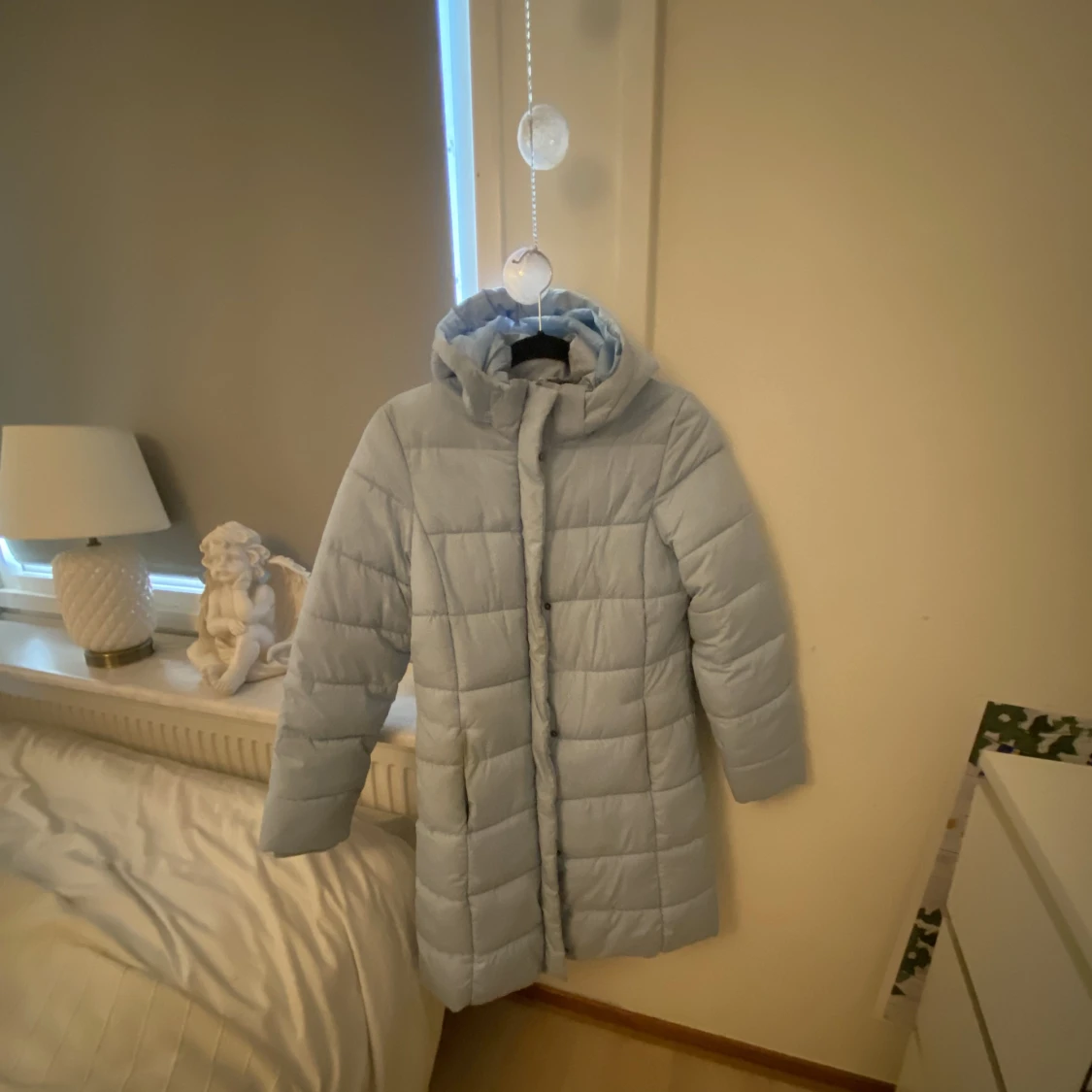 Ljusblå lång jacka - 90