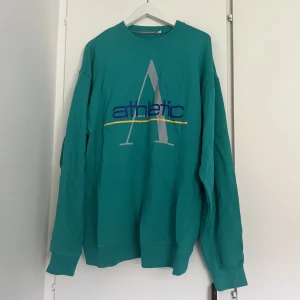 Grön/blå Homebound Jumper - Knappt använd 