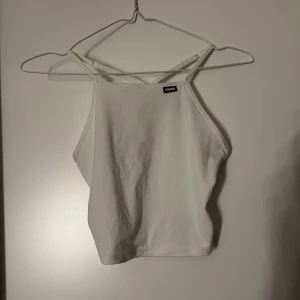 Linne - Linne med mesh tyg i ryggen. Fint skick! 