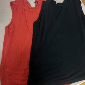 Hej! Jag säljer två sköna linnen i rött och svart i storlek S för totalt 60 kr. Skriv om du har några funderingar.