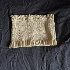 Tubetopp  - Lite sliten