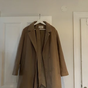 Kappa - Fin kappa som är för liten för mig, storlek 38. 