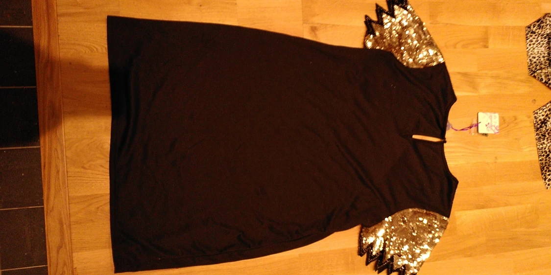 Nyårstunika tunika guldpaljett på armar