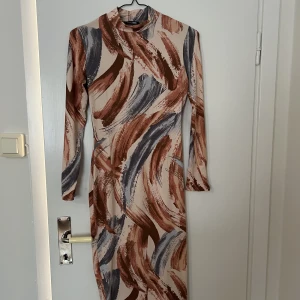 Klänning - Långärmad super skön i bomullsmaterial. 