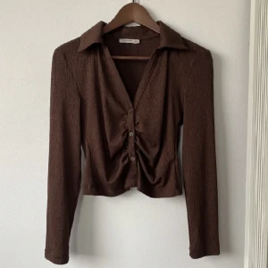 Brun blus - Brun blus