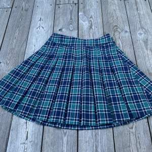 Blue and green plaid pleated skirt, size xxs but fits xxs-s work around twice