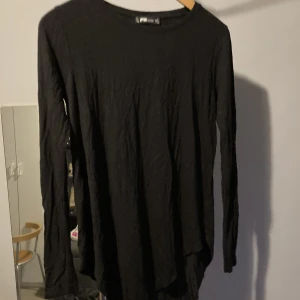Svart tröja - Storlek S.