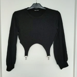 Långärmad topp - En svart långärmad topp från Shein, aldrig använd