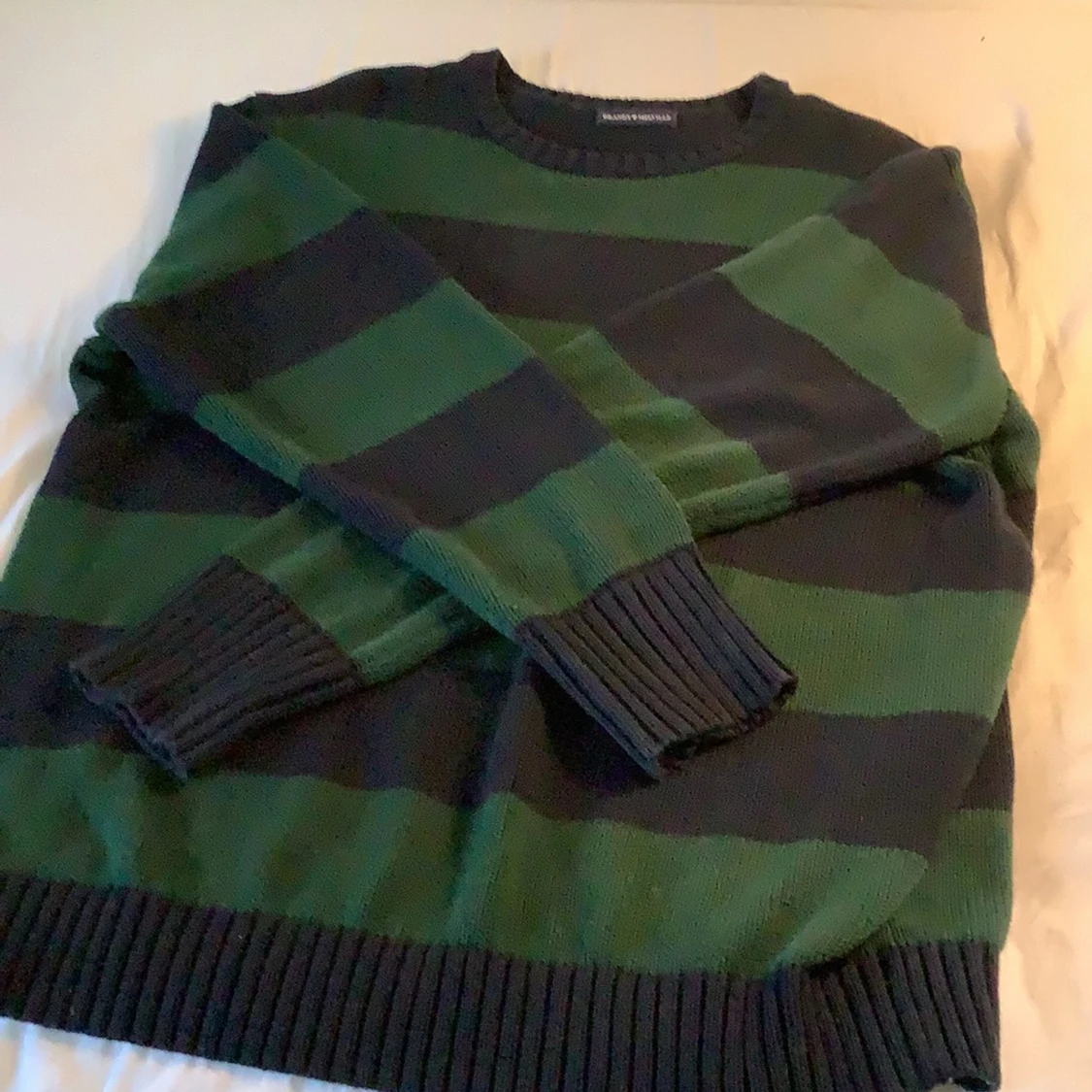 Grön och svart tröja