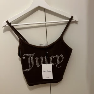 Juicy linne - Brunt juicy linne i storlek S. Aldrig använt med tag kvar.
