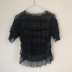 Transparent t-shirt - Transparent t-shirt i svart Size: S/M