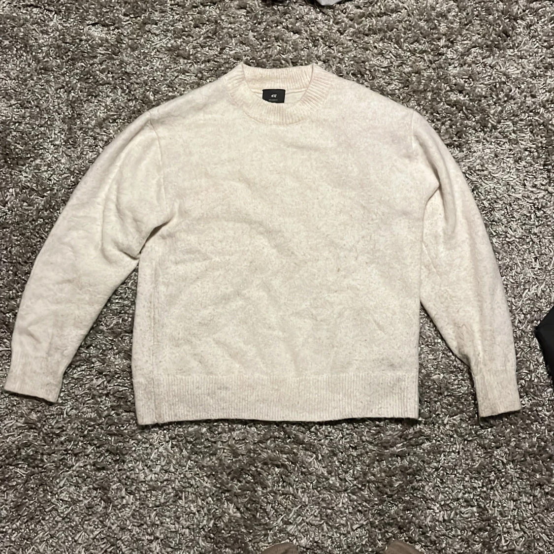 vit stickad tröja i alpaca-mix