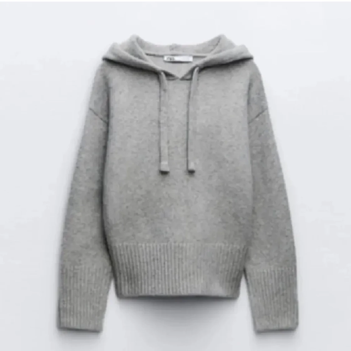 Stickad hoodie
