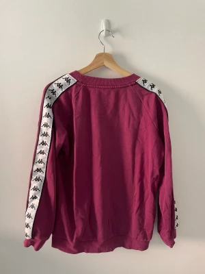 kappa sweater - storleken är som en tight M