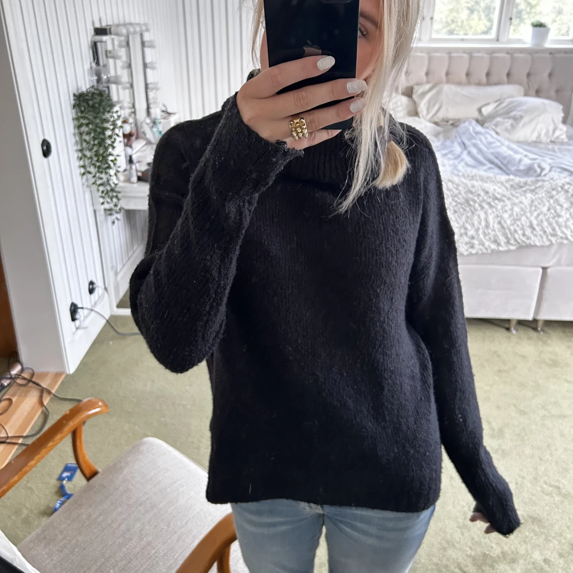 Svart stickad tröja