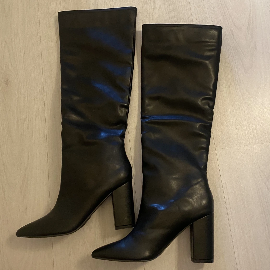 Högklackade boots