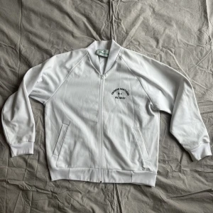 Trackjacket Emsmore - Full zip bowlingjacka. Helgo!