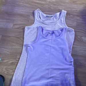 2pack linnen  - Super söta linne jag skulle säga att den är i storlek xs. 