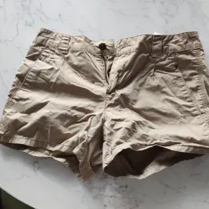 Safari shorts, brown, worn just a few times. In good shape.