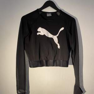 Black Puma top, size 44 with arms in mesh 