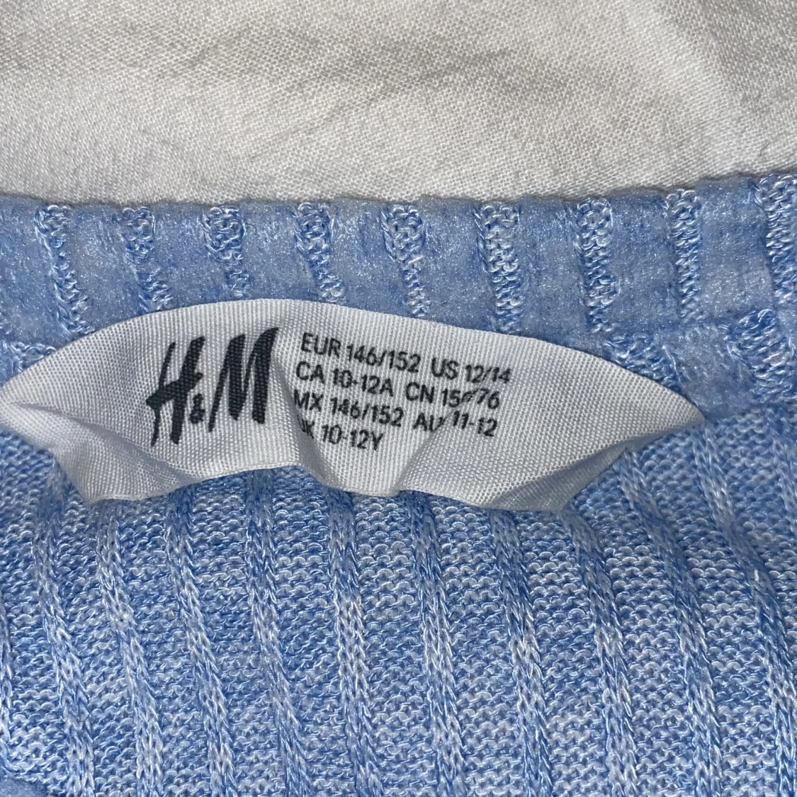 Blå, tun, stickad tröja  - 91