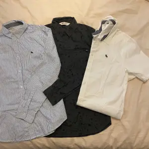 2 långärmade skjortor och 1 kortärmad skorta i storlek 164 cm från h&m. (13-14 år.) Oanvända.
