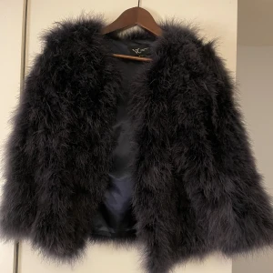 Struts jacka - Grå struts jacka i storlek 34 