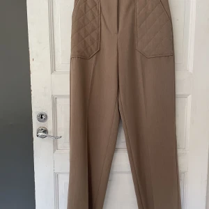 Finbyxor beiga  - Beiga finbyxor st 38 