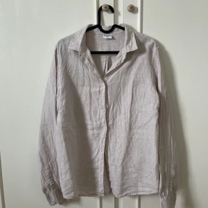 Linneskjorta - Beige linneskjorta.