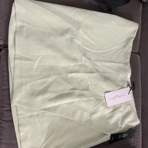 Omvänd Minikjol  - Oanvänd mintgröna minikjol  36