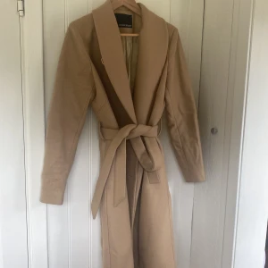 Superfin kappa  - Lång fin kappa från Rodebjer