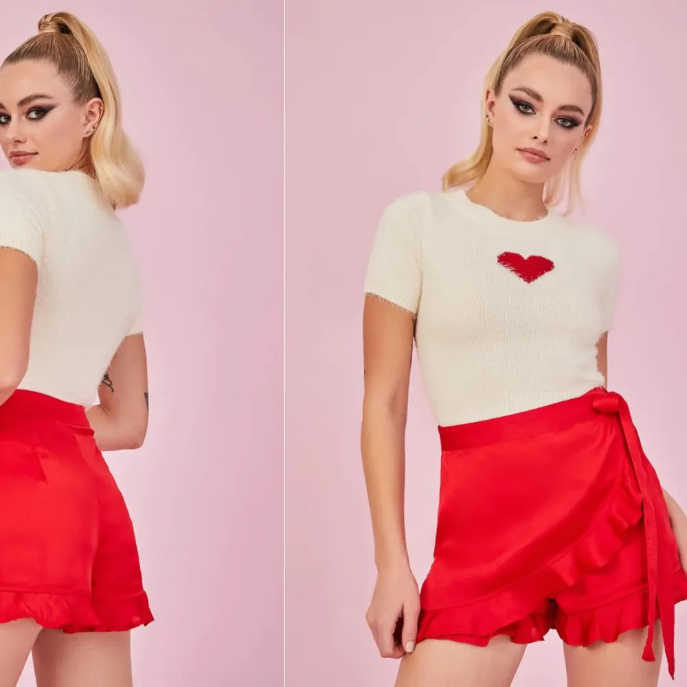 Röda shorts från Sugar Thrillz. Fint skick. Storlek XS. Köpta på Dollskill för ca 560 kr. . Shorts.