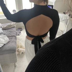 Topp öppen rygg - Jättefin topp med öppen rygg, knappt använd