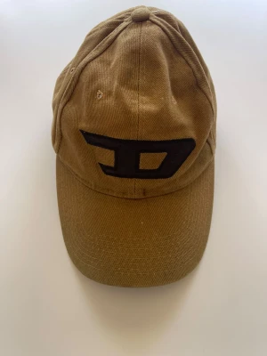 Diesel keps  - Aldrig använd av mig, köpt second hand 