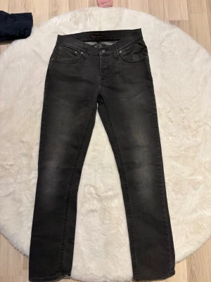 Svarta jeans från Nudie Jeans - Mycket fint skick 