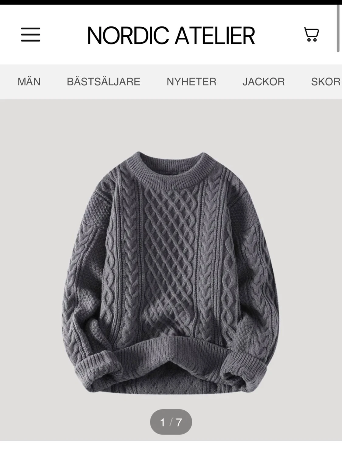 Grå kabelstickad tröja från Nordic Atelier