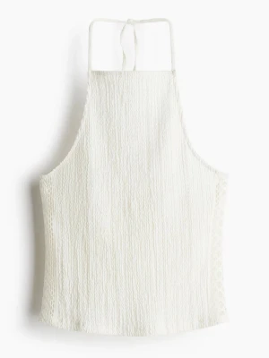 Halterneck topp - Halterneck topp från h&m, jättefina detaljer på sidorna, S/M