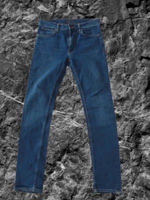  jeans från Nudie Jeans - Säljer ett par klassiska blå jeans från Nudie Jeans W33 L 32 