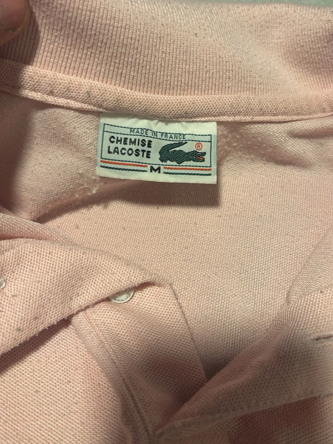 Ljusrosa pikétröja från Lacoste - 1