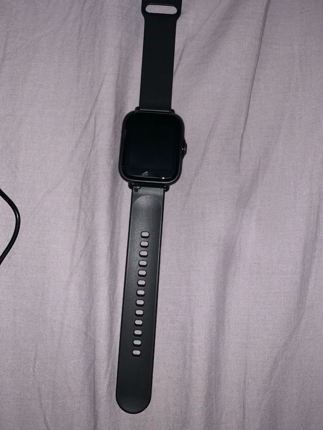 Svart smartklocka med silikonarmband