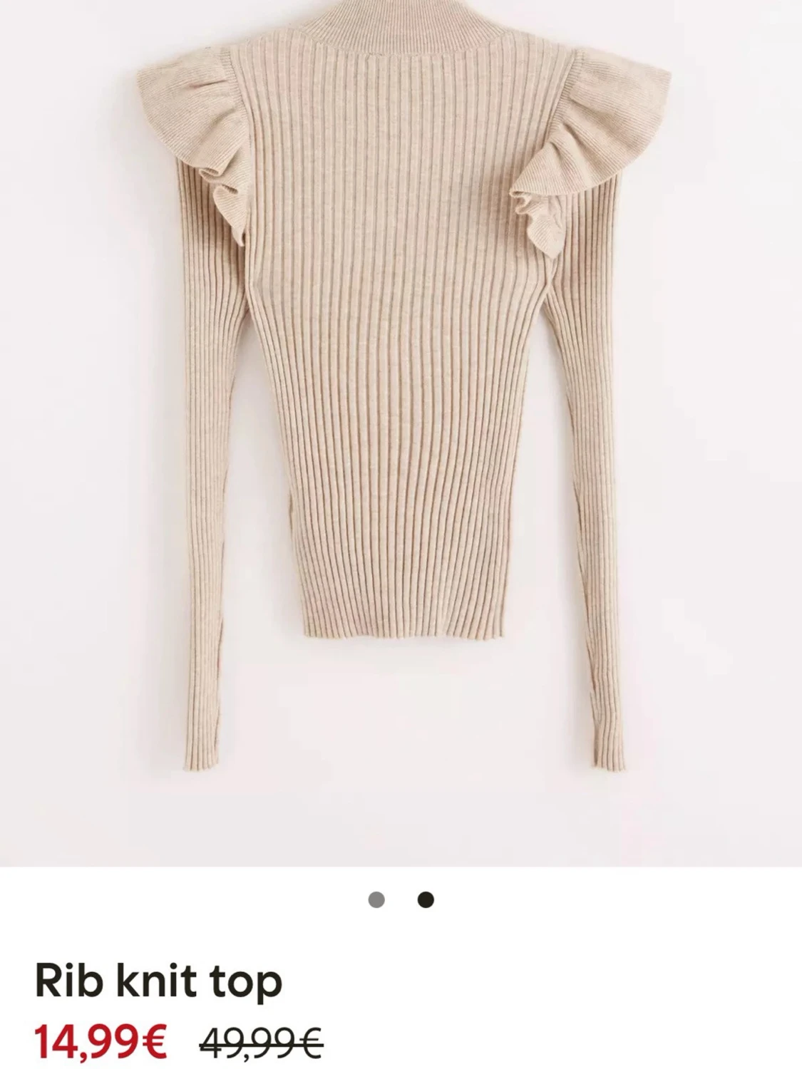 Beige ribbad stickad topp med volanger - 1