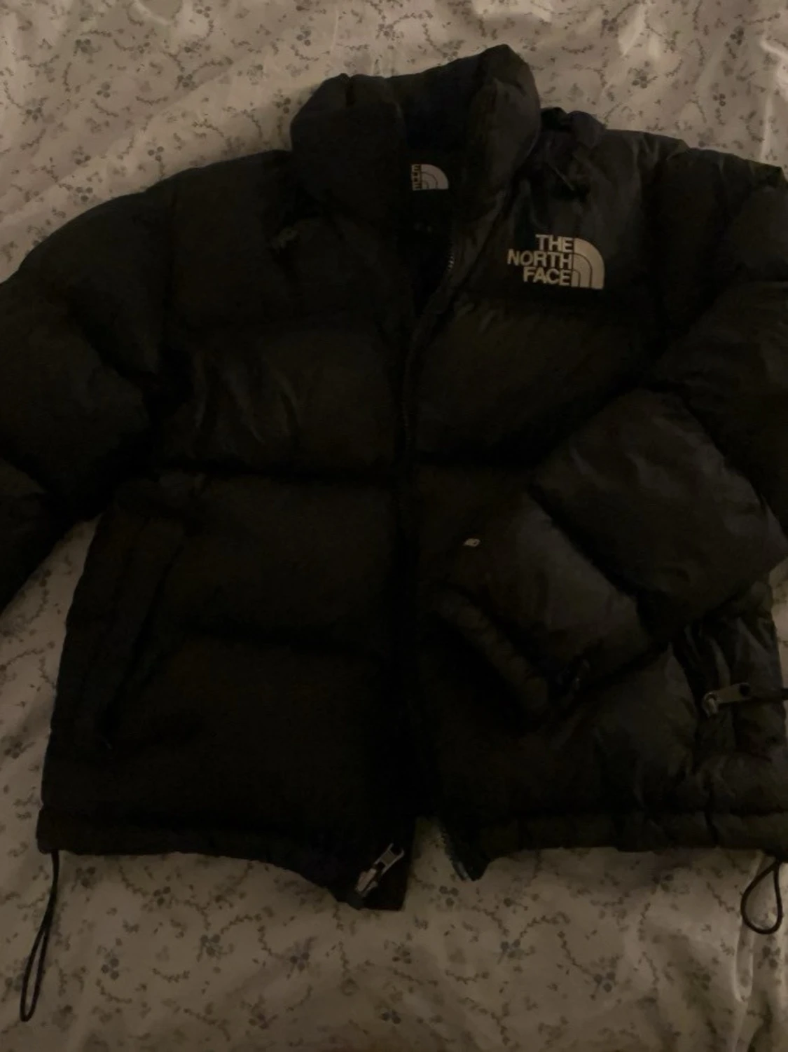 Svart pufferjacka från The North Face