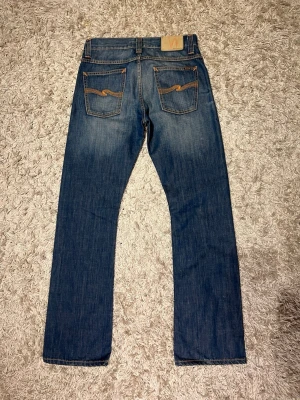 Nudie jeans vintage regular ralf bootcut flared archove ola rare fade wash - Vintage nudie jeans av modell regular alf med en bootcut passform. Vintage men i nästan nytt skick. Storlek 30/32, fin tvätt. Postas antigen samma dag som köp eller dagen därpå💯🙌