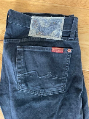 Acne studios jeans  - Svart/grå lågmidjade jeans från acne studios 